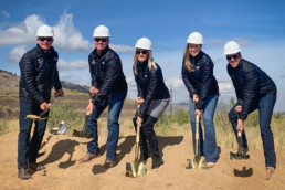 Confluence Companies leadership team at a ground breaking ceremony for a real estate development and housing development