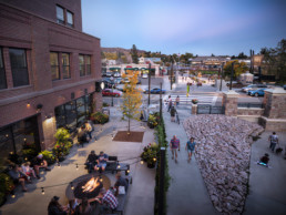 People enjoying the outdoor patio at Riverwalk Castle Rock