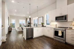 A kitchen in an apartment unit at ZIA Sunnyside