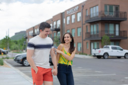 Couple walking through the parking lot at Basecamp