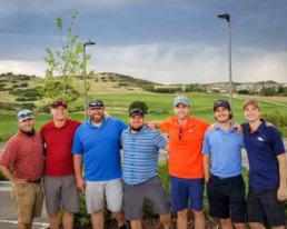 real estate development company employees playing golf