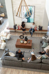 residents enjoying the lounge at the Riverwalk real estate development