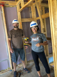 confluence cares employees at housing development project uai