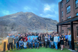 Confluence Companies Team Photo Outside The Eddy Taproom and Hotel uai