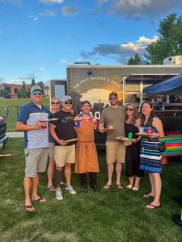 Confluence Companies team in front of The Eddy community food truck
